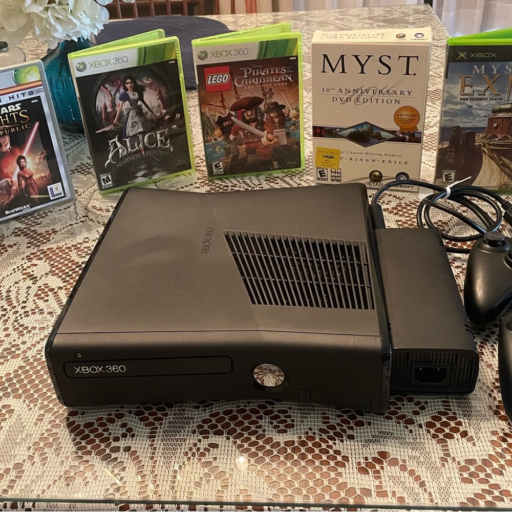 XBox 360 Unit, 2 Controllers, Kinect System, and 4 Games